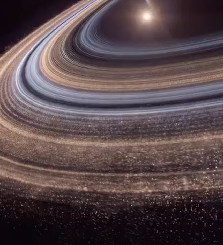 Saturn's golden rings sweeping through space